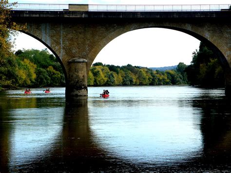 Dordogne River Canoes Photograph by Leonard Sharp - Fine Art America