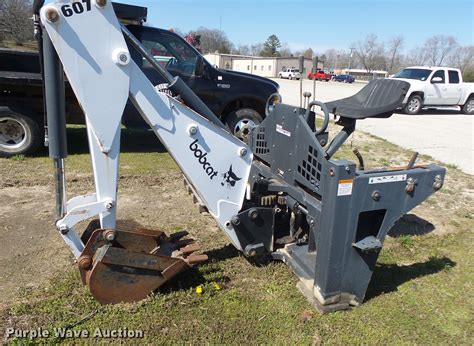 Bobcat 607 skid steer backhoe attachment in Willow Springs, MO | Item DE3621 sold | Purple Wave