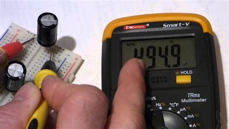 How to measure capacitance of capacitors with a multimeter able to do ...