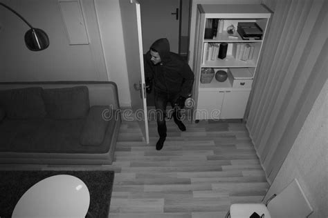 Thief Entering into House stock image. Image of male - 210428769