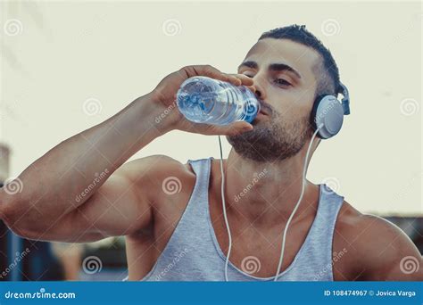 Man Drinking Water from a Bottle Stock Image - Image of handsome ...