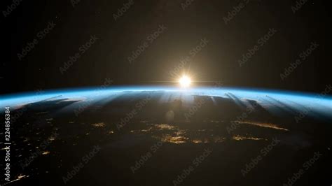 Sunrise from space. Earth from space. Version 2018. Beautiful atmospheric sunrise from Earth ...