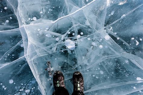 Premium Photo | Person over frozen lake baikal