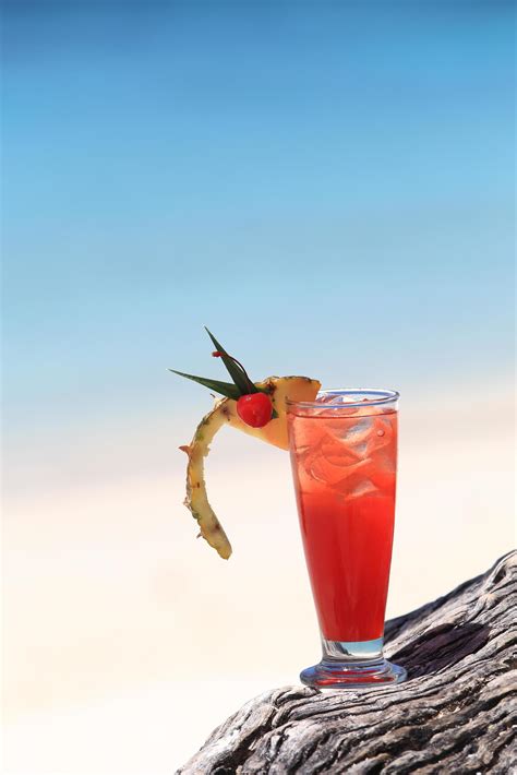 fruit cocktail on a tropical island beach 10257892 Stock Photo at Vecteezy