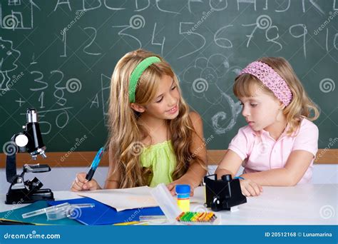 Kids Students In Classroom Helping Each Other Royalty Free Stock Photos - Image: 20512168