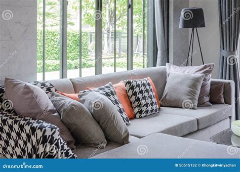 Modern Living Room with Grey Sofa and Pillows Stock Photo - Image of ...