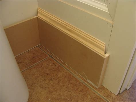 Half Bathroom Renovation: Installing the Baseboard Cap Molding - The Joy of Moldings