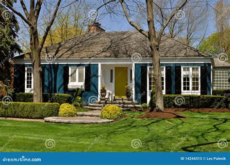 Blue House With Nice Landscaping Stock Image - Image: 14244313