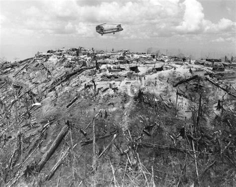 A supply helicopter comes in for a landing on a hilltop forming part of Fire Support Base 29 ...