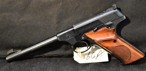 Sold at Auction: COLT "WOODSMAN" 22 CAL LR AUTOMATIC PISTOL