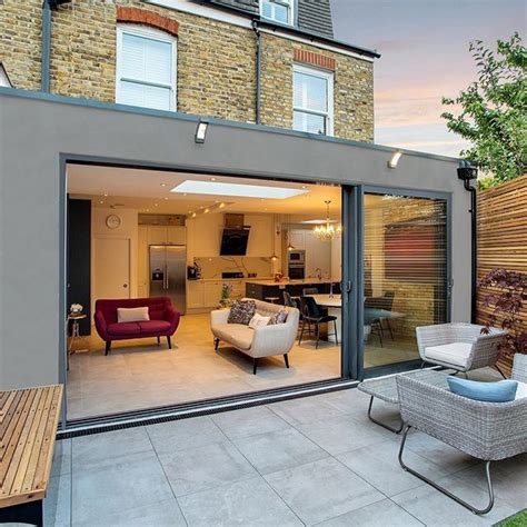 A stylish wraparound contemporary flat roof extension in Tooting ...