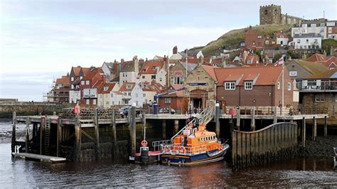 Whitby Lifeboat crew suspended after 'sexual material' probe - BBC News