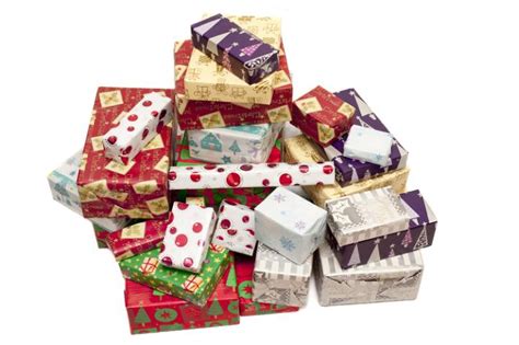Photo of Colorful pile of Christmas gifts in seasonal wrap | Free christmas images