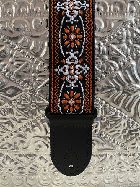 Guitar Strap LM Retro Jacquard Deluxe Black/orange - Kaj's Guitar Store