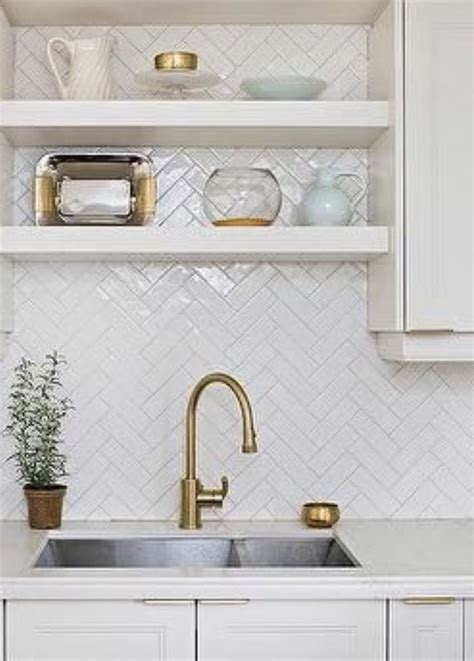 Backsplash white favorite | White herringbone backsplash, Herringbone tile backsplash, Kitchen ...