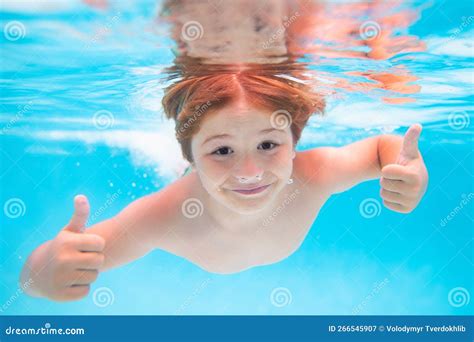Child Face Underwater with Thumbs Up. Child Swimming Underwater in Swimming Pool Stock Image ...