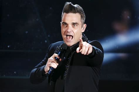 Robbie Williams announces arena tour to celebrate 25 years as solo ...