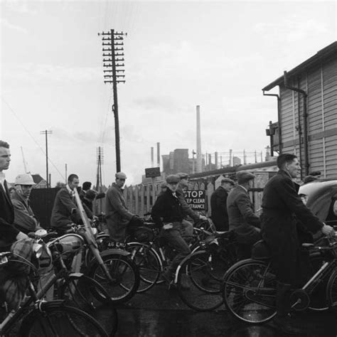 Cyclists pass through Ponders End station, Enfield, London, 1957. | London museums, London, Old ...