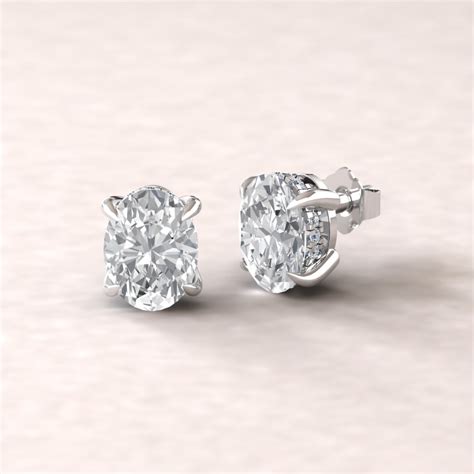 Oval Cut Forever One Moissanite Earrings With Diamond Halo - From our Beverly Collection ...