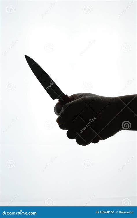 Hand Holding a Kitchen Knife Stock Image - Image of shadow, criminal ...