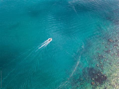 "Drone Shot Of A Boat Sailing In Emerald Waters In Kapas, Malaysia" by Stocksy Contributor ...