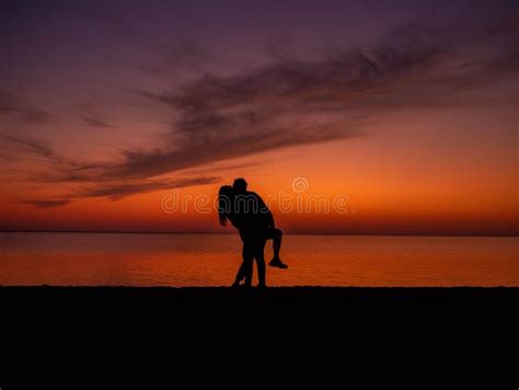 Romantic Couple Hugging and Kissing during Sunset. Stock Photo - Image of romantic, admires ...