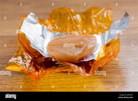 Quality Street toffee penny sweet unwrapped Stock Photo - Alamy