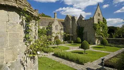 Visit the National Trust's Nymans, an intimate garden set around a romantic house and ruins near ...