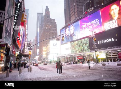 Snow Covered Times Square Stock Photo - Alamy