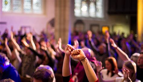 Worshippers Raise Their Hands At A Christian Church Service Stock Photo ...