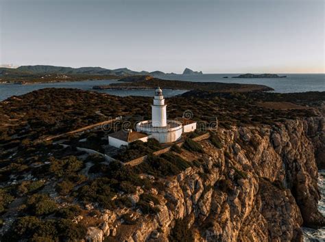 Lighthouse on Illa Sa Conillera Island in Ibiza at Sunset Stock Photo ...