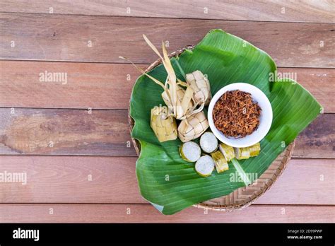 Ketupat, lemang, served with serunding, popular Malay delicacies during ...