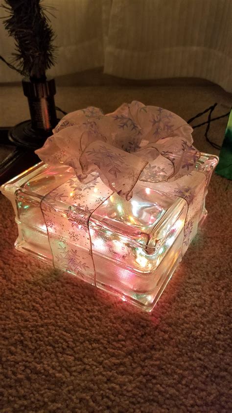 Christmas lights in a glass block. : r/pics