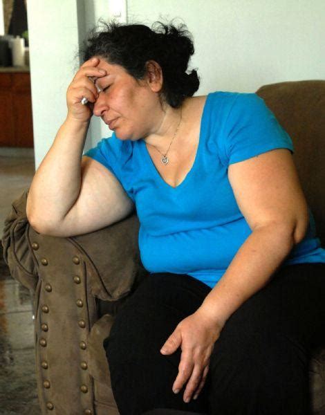 Soheyla Kazemi reacts at her home in Orange Park, Fla. Sunday, July 5 ...