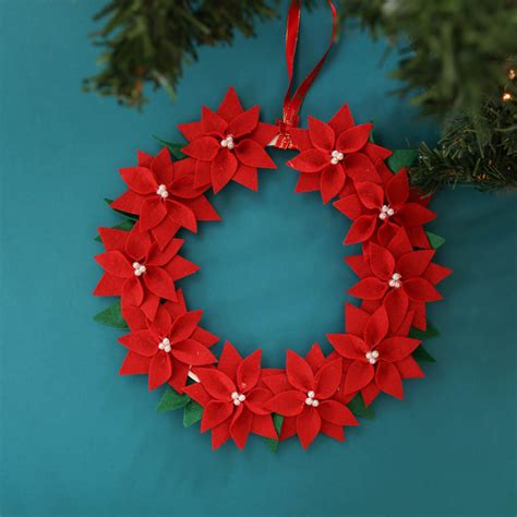 Ruby Red Poinsettia Wreath | Who We Are