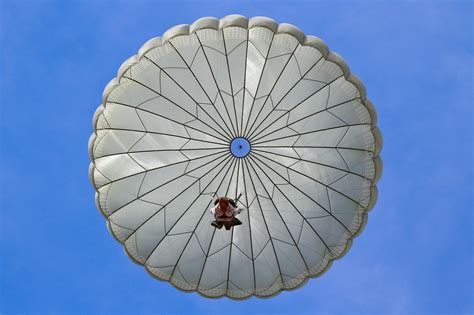 Soldiers assigned to the Military Freefall School conduct freefall operations at Yuma Proving ...