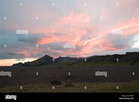 Iceland, sunset over volcanic mountains Stock Photo - Alamy