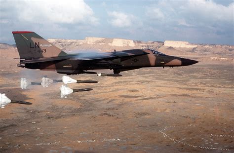 General Dynamics F-111A Aardvark releasing Mk 82 bombs | A Military Photo & Video Website