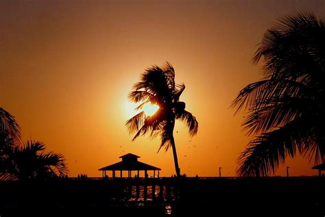 Sunset over Fort Myers Beach FL Photograph by Olli Kay - Fine Art America