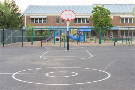 Basketball court inside elementary school — Stock Photo © wayfarerlife ...