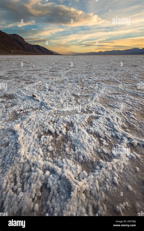 The iconic landscape of Badwater Basin, lowest elevation in the western hemisphere, during ...