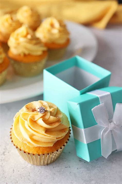 24 karat gold cupcakes are made with moist gold cake topped with shimmering gold buttercream ...