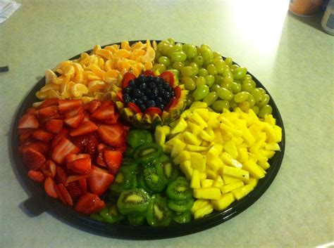 Fruit Tray with a pineapple centerpiece- made for Christmas dinner | Food design, Fruit tray ...