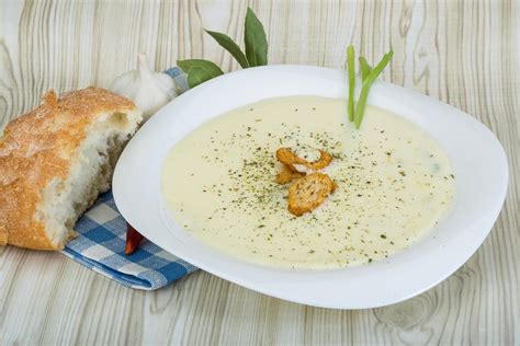 Cheese soup with croutons 12064889 Stock Photo at Vecteezy