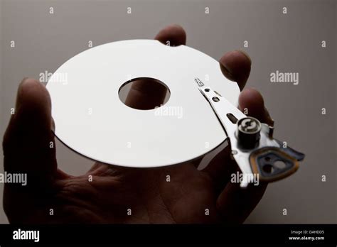 Hard disk drive platter and read/write head Stock Photo - Alamy