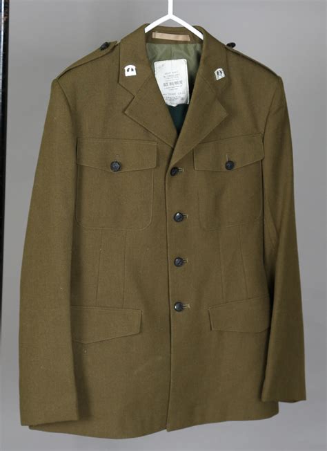 A post-1952 Royal Irish Regiment uniform, comprising parade jacket with Inniskilling collar badges,