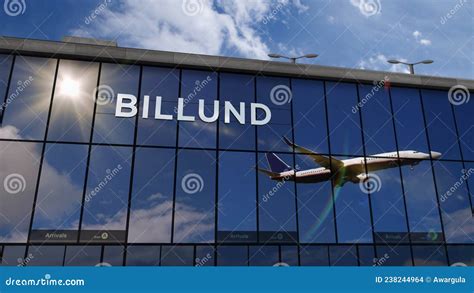 Airplane Landing at Billund Denmark Airport Mirrored in Terminal Stock ...