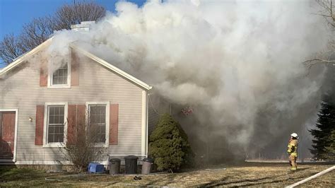 Heavy smoke, flames reported at 100-year-old house fire in Harmony Twp.