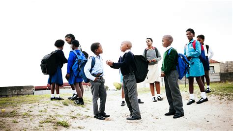 Kid Walking To School In Africa