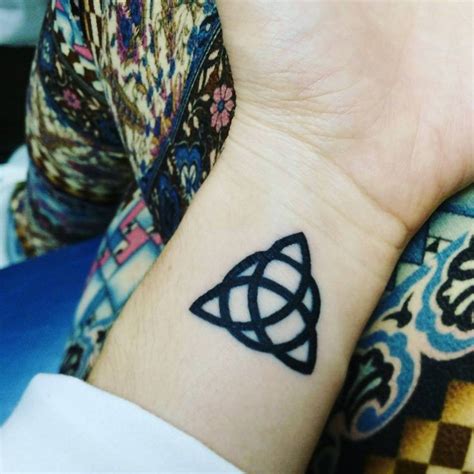 Thinking About Getting a Celtic Trinity Knot Tattoo? Read This First | Knot tattoo, Trinity knot ...